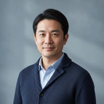 Portrait of Kenji Watanabe, VP Fulfillment at Pacific Rim Retail